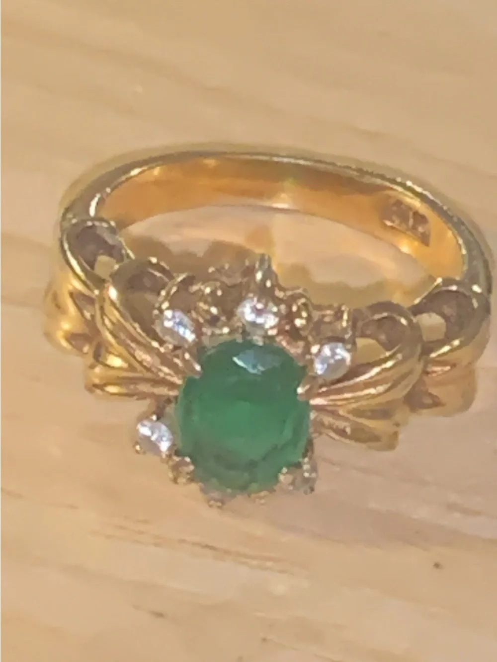 Elegant Gold-Tone Ring with Green Stone